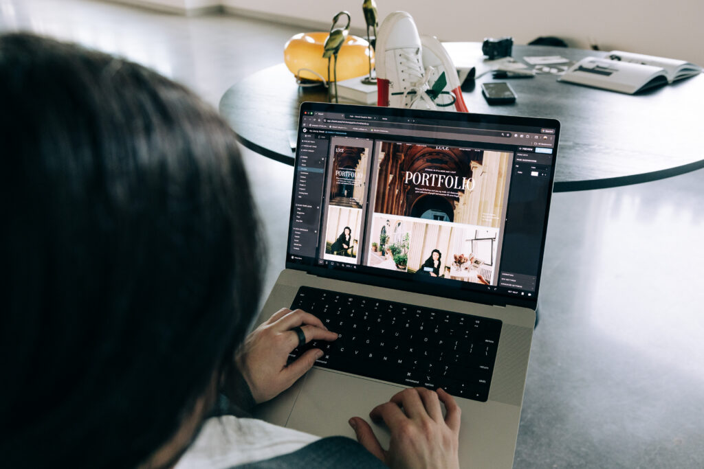 Woman working on a laptop fixing website mistakes