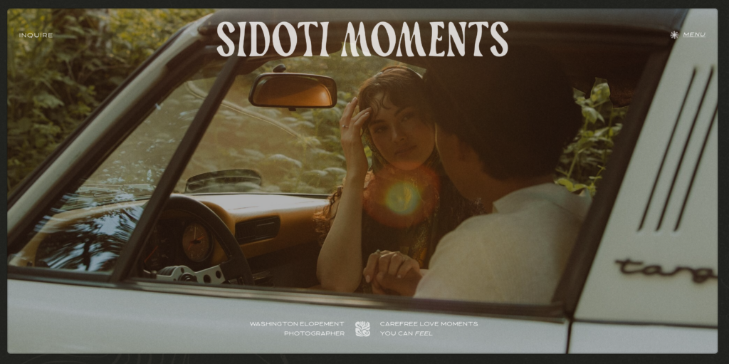 A full-bleed hero image from sidotimoments.com showing an intimate film-toned moment of a couple inside a vintage car, with the Sidoti Moments wordmark centered at the top of the page